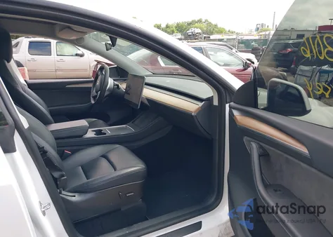 2023 Tesla Model Y Awd/Long Range Dual Motor All-Wheel Drive из США, поврежденный, VIN 7SAYGDEE6PF620991